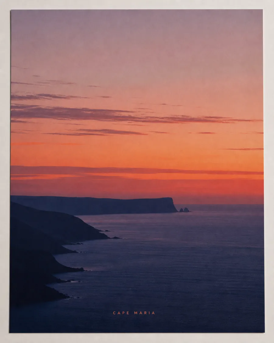 Wall-art poster from a dusk coastal photograph — headland silhouettes under an orange and indigo sky — captioned CAPE MARIA in small type.